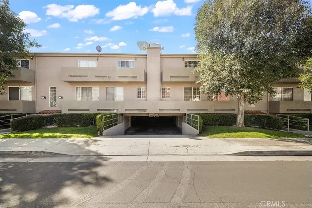 a view of swimming pool with a yard in front of it