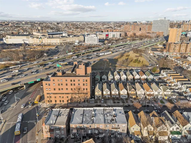 an aerial view of a city with lots of residential buildings