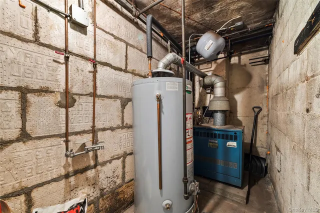 a view of storage and utility room with washer and dryer