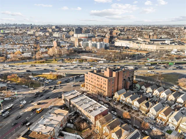 an aerial view of a city with lots of residential buildings