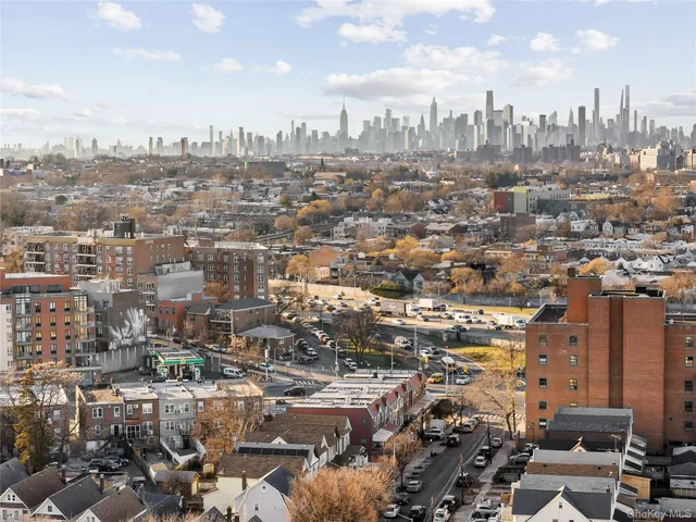 a kitchen with stainless steel appliances granite countertop a stove and a refrigerator