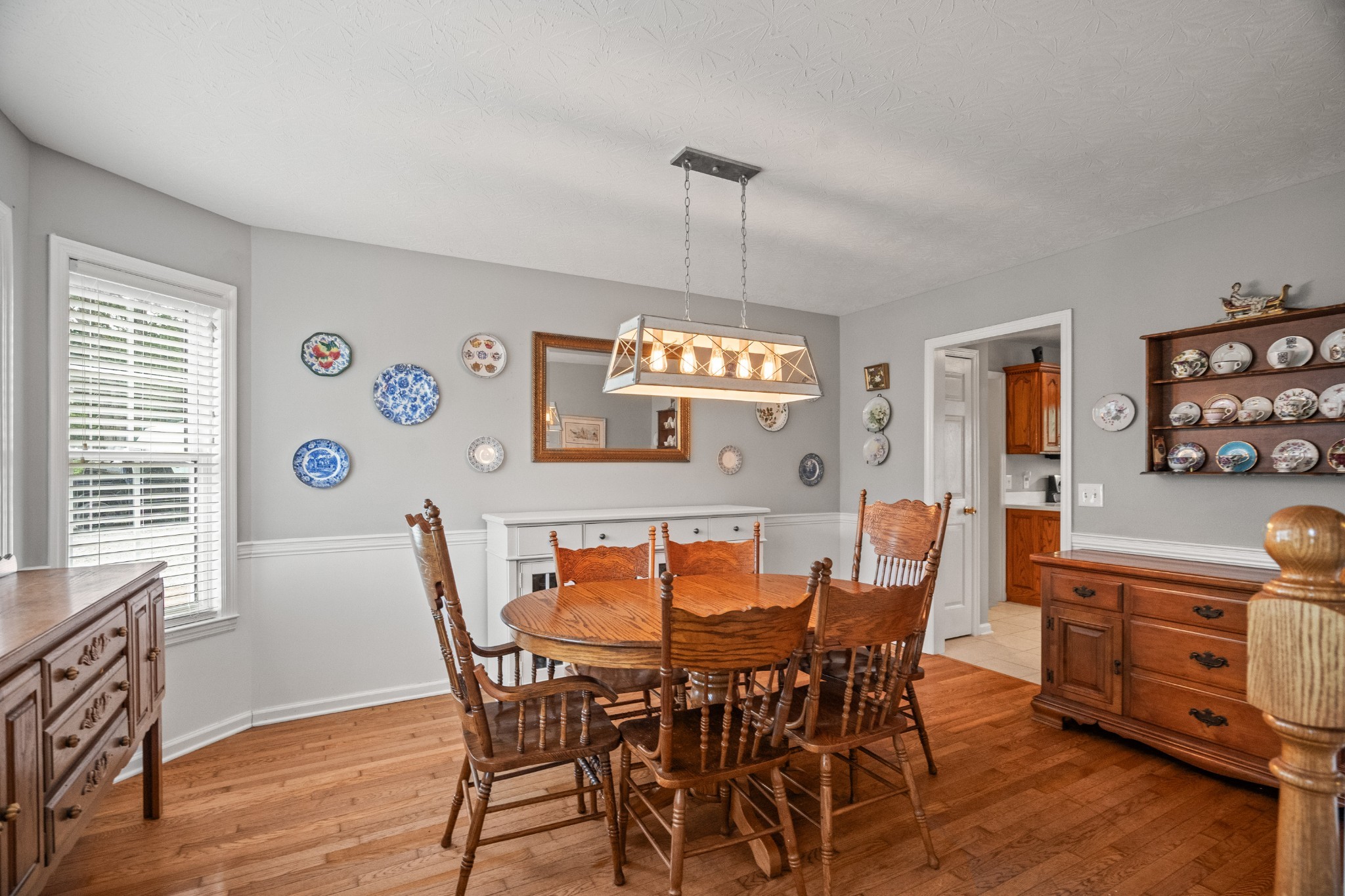 116 Old Parkers Chapel Road Portland, TN 37148 - Photo 22 of 64 a view of a dining room with furniture window and wooden floor