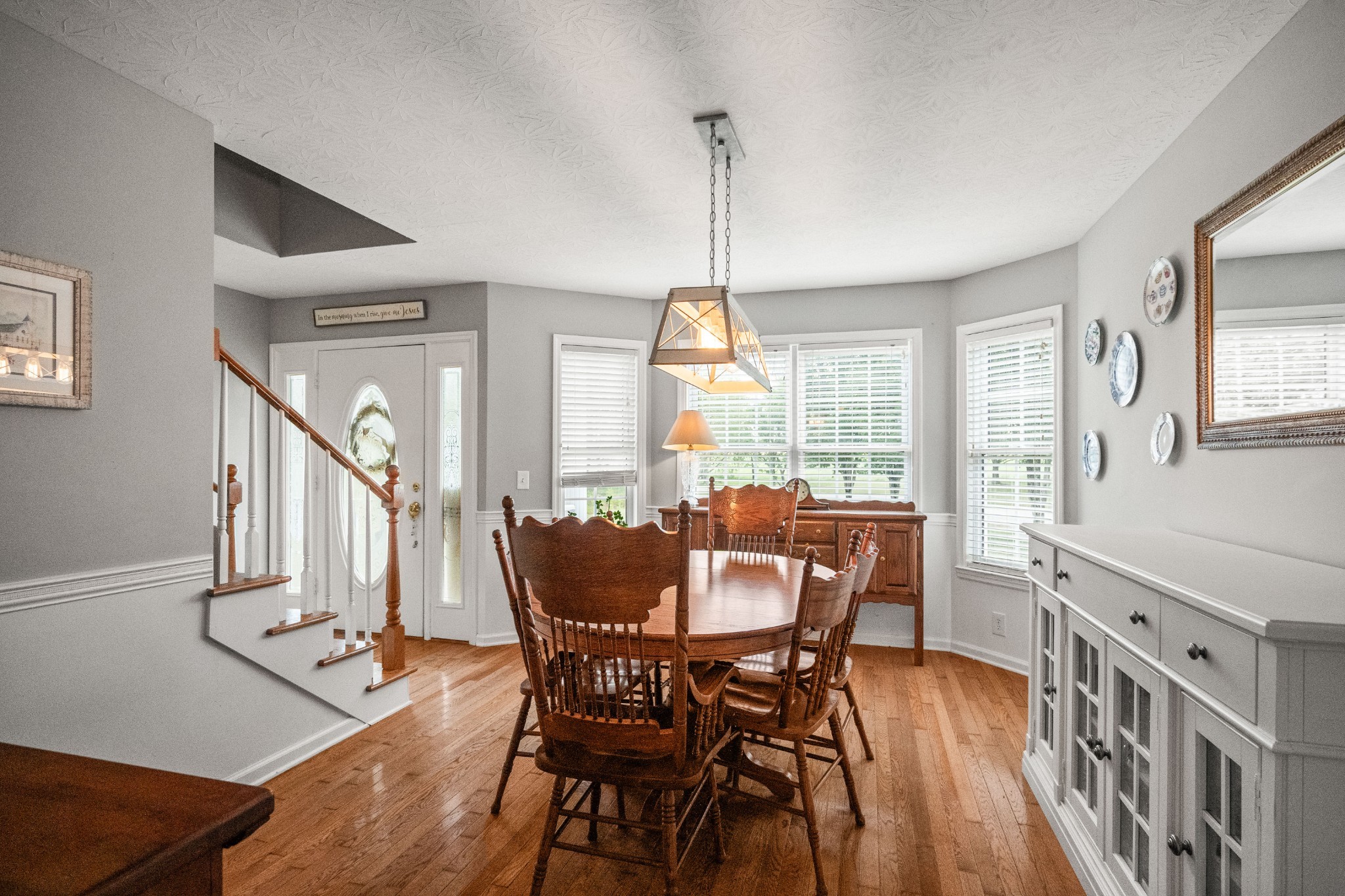 116 Old Parkers Chapel Road Portland, TN 37148 - Photo 24 of 64 a view of a dining room with furniture window and wooden floor