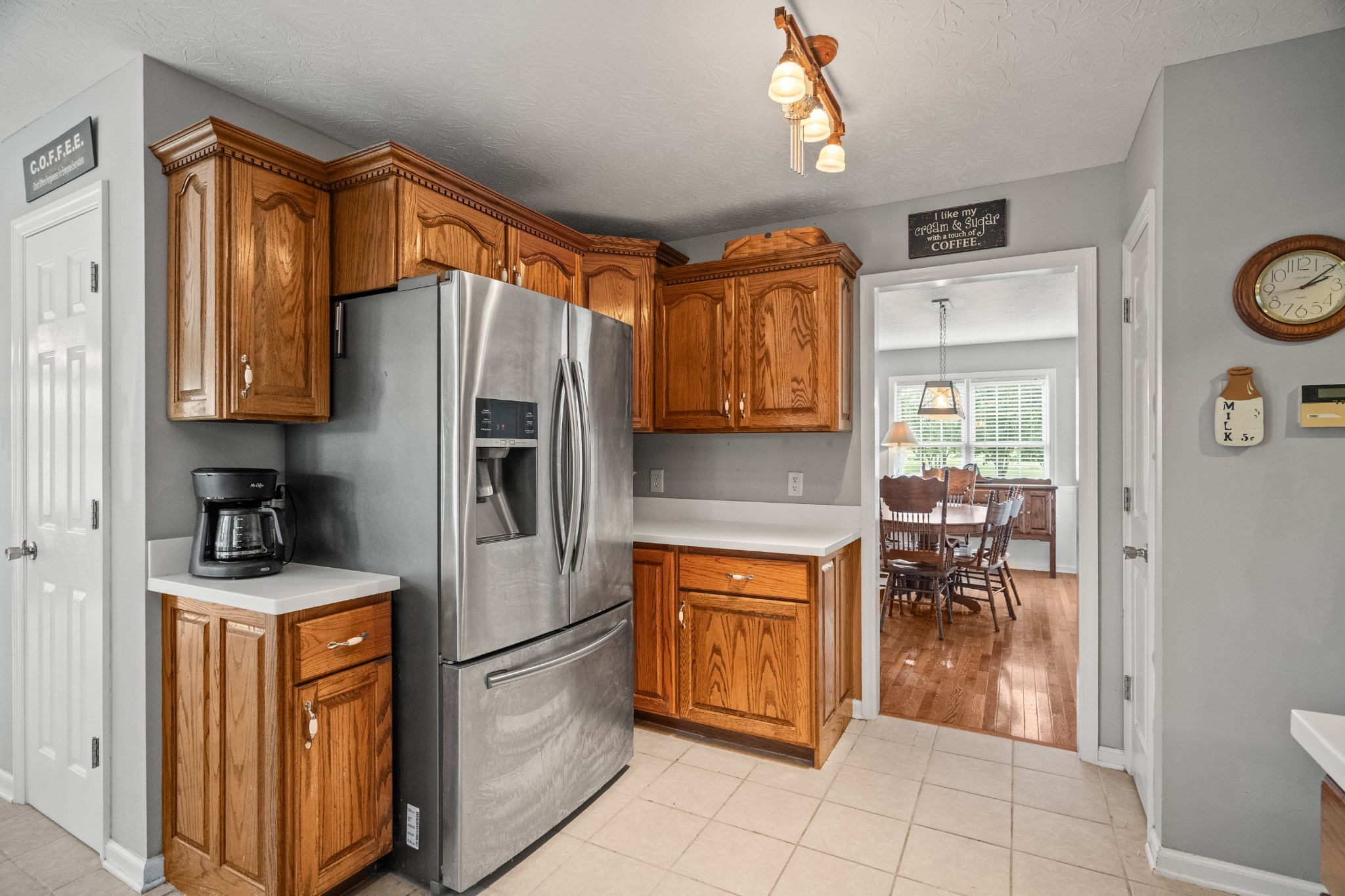 116 Old Parkers Chapel Road Portland, TN 37148 - Photo 28 of 64 a kitchen with stainless steel appliances granite countertop a refrigerator and a stove top oven