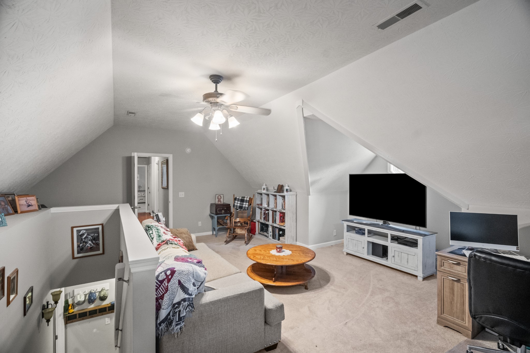 116 Old Parkers Chapel Road Portland, TN 37148 - Photo 42 of 64 a view of a livingroom with furniture and a flat screen tv