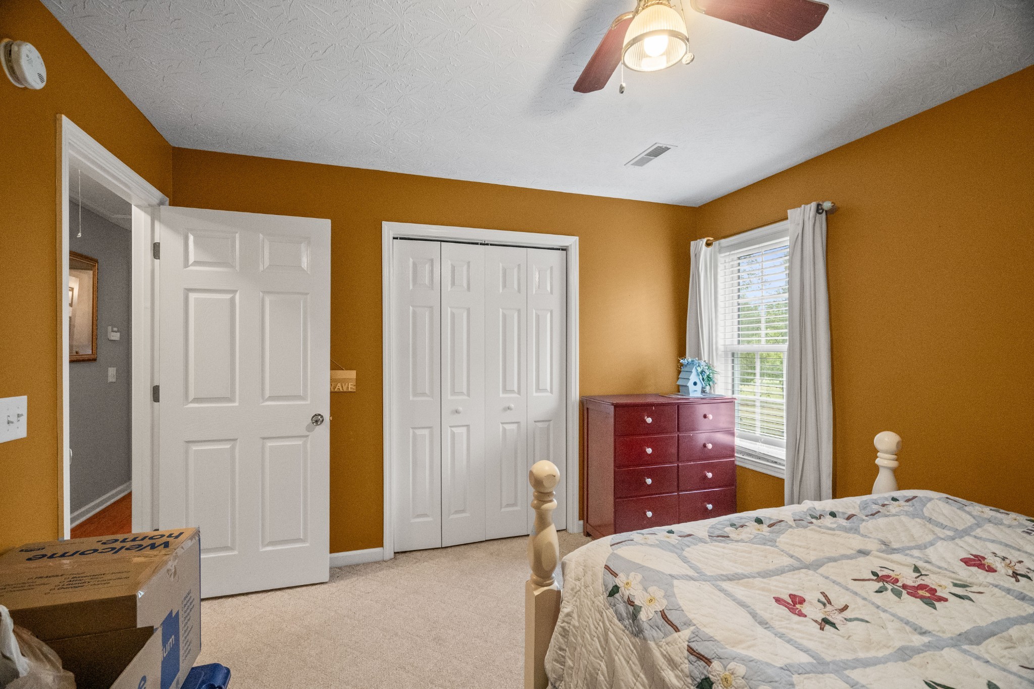 116 Old Parkers Chapel Road Portland, TN 37148 - Photo 49 of 64 a bedroom with a bed and a dresser