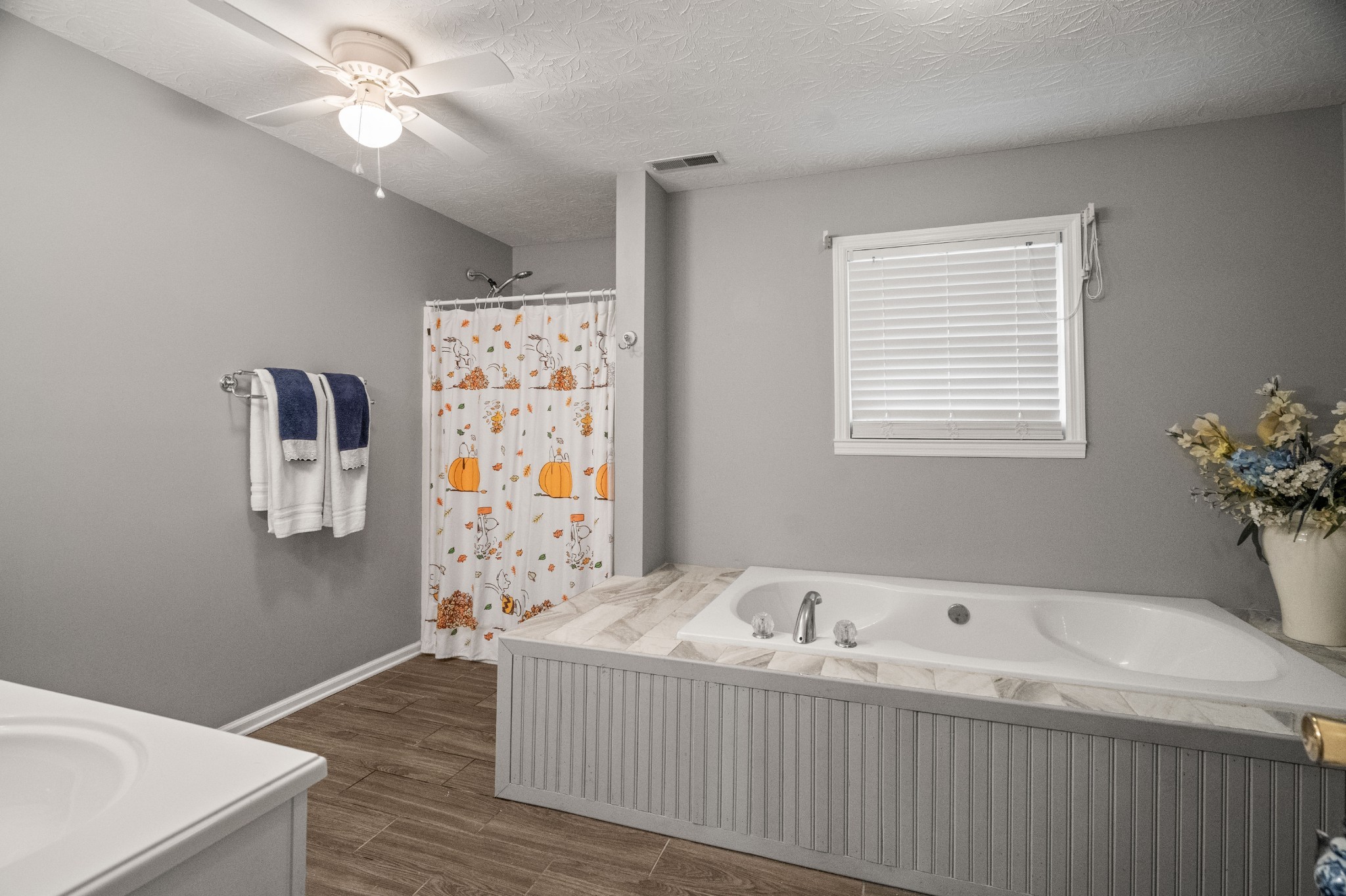 116 Old Parkers Chapel Road Portland, TN 37148 - Photo 52 of 64 a bedroom with a bed and a chandelier