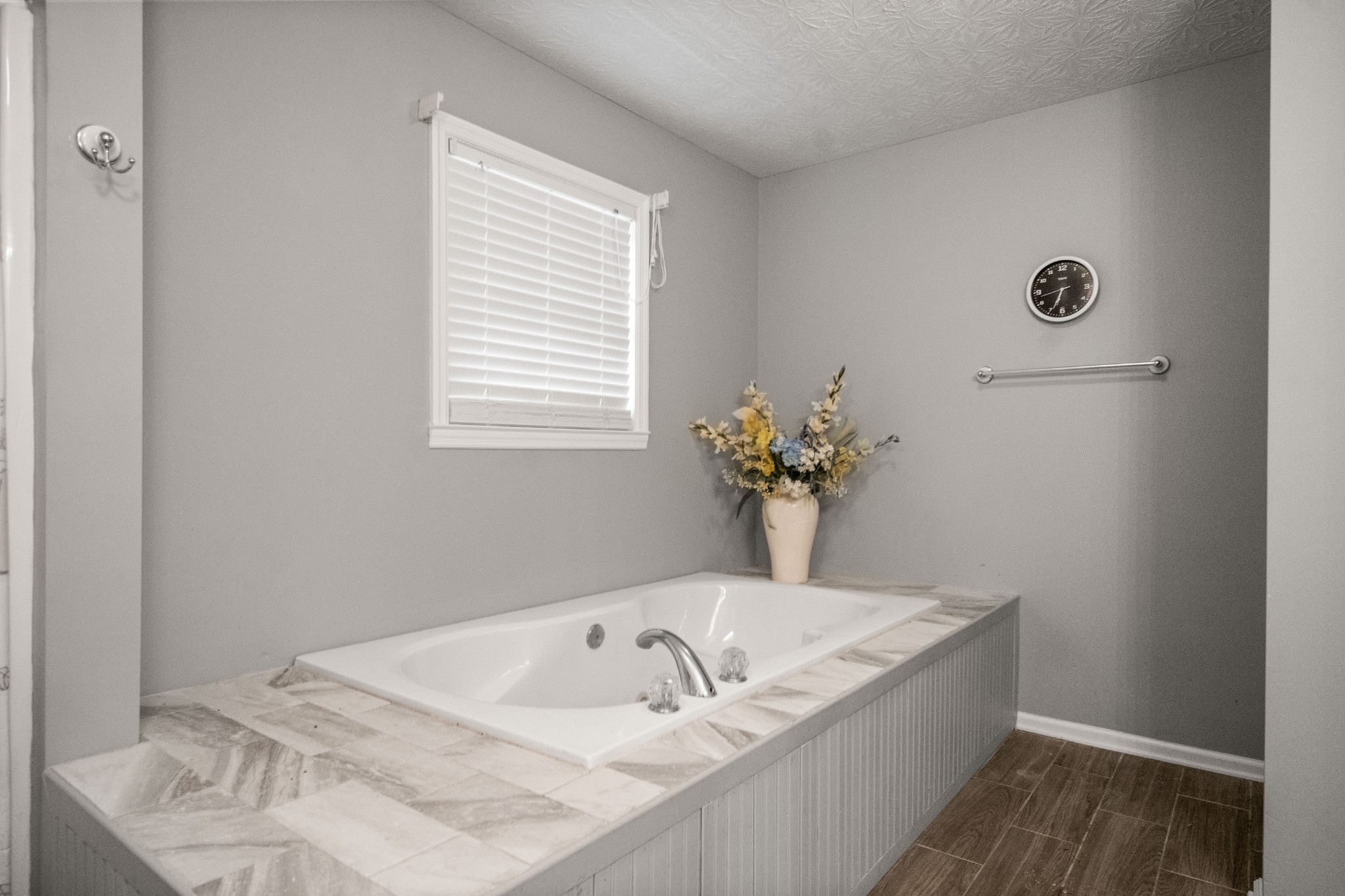 116 Old Parkers Chapel Road Portland, TN 37148 - Photo 54 of 64 a bath tub sitting in a bathroom next to a window