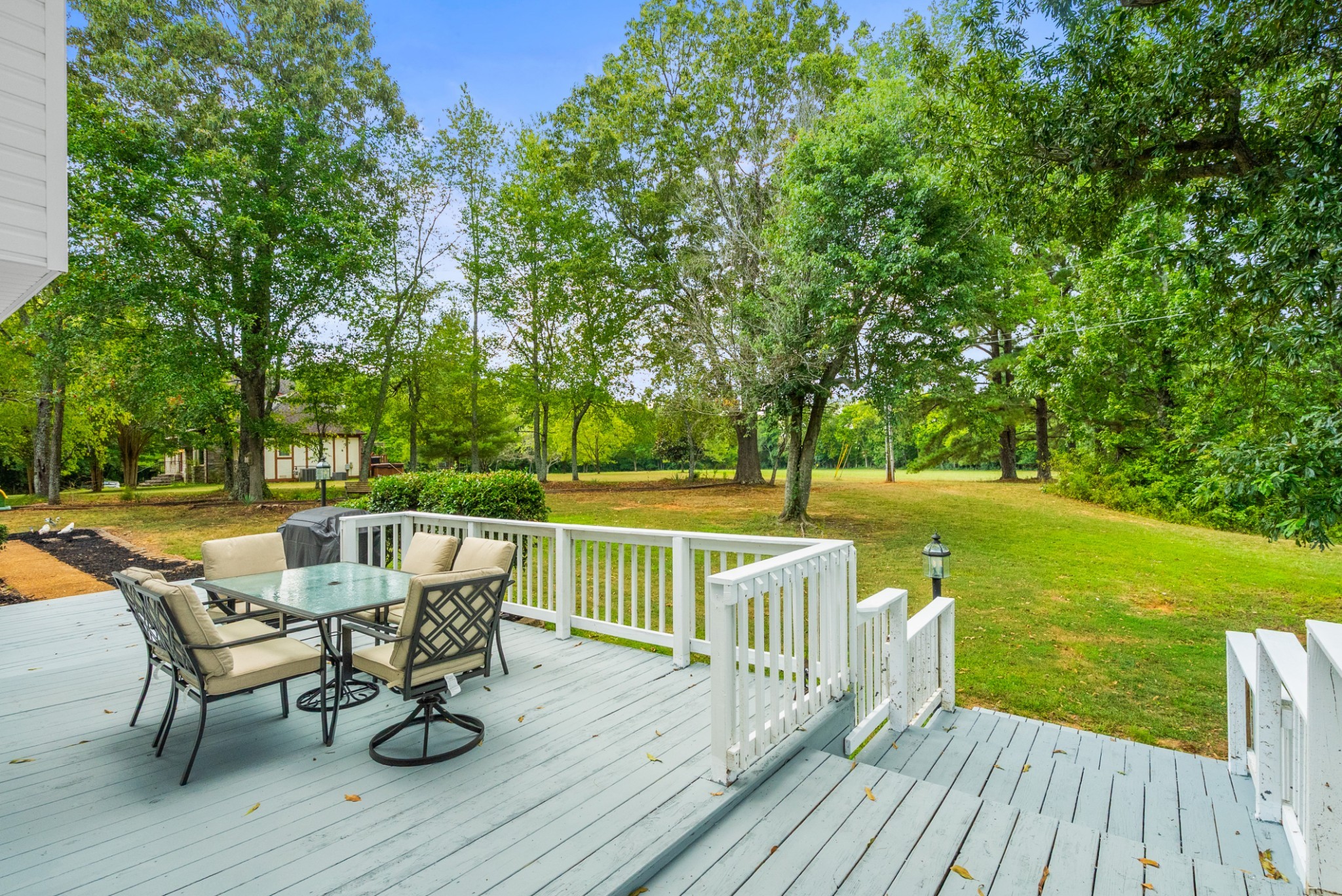 116 Old Parkers Chapel Road Portland, TN 37148 - Photo 56 of 64 a view of a deck with chair and wooden floor