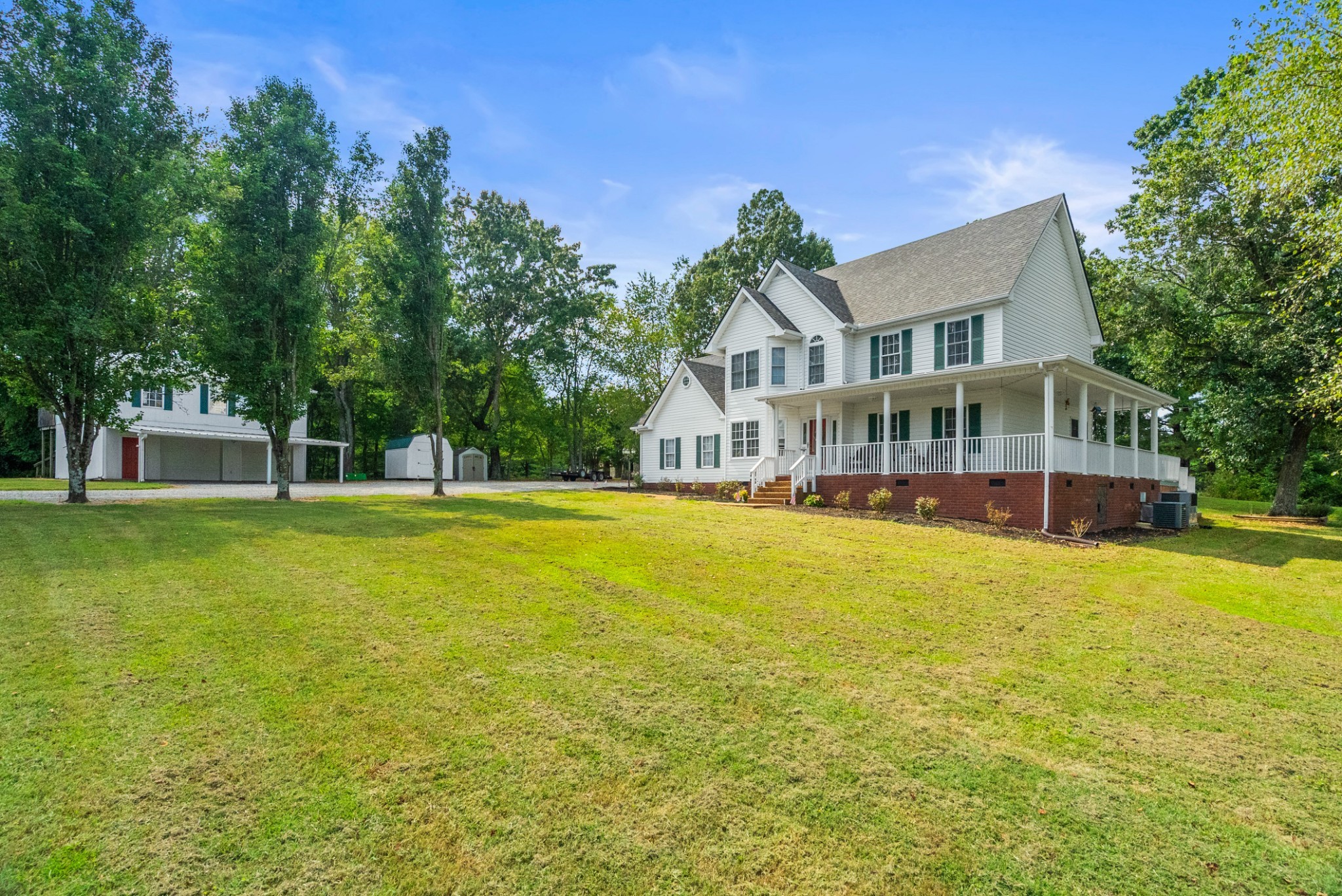 116 Old Parkers Chapel Road Portland, TN 37148 - Photo 9 of 64 a front view of a house with swimming pool
