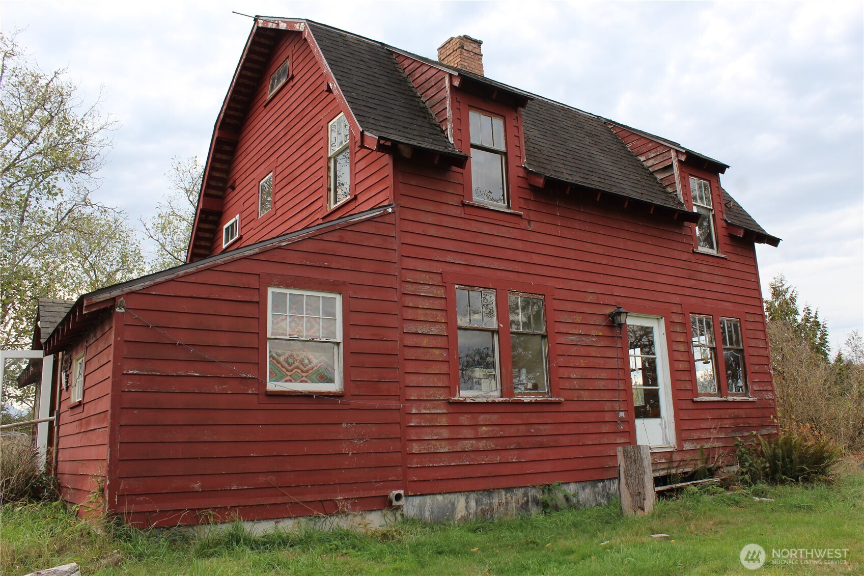 2600 Center Road Chimacum, WA 98325 - Photo 3 of 22 a view of a house with a yard