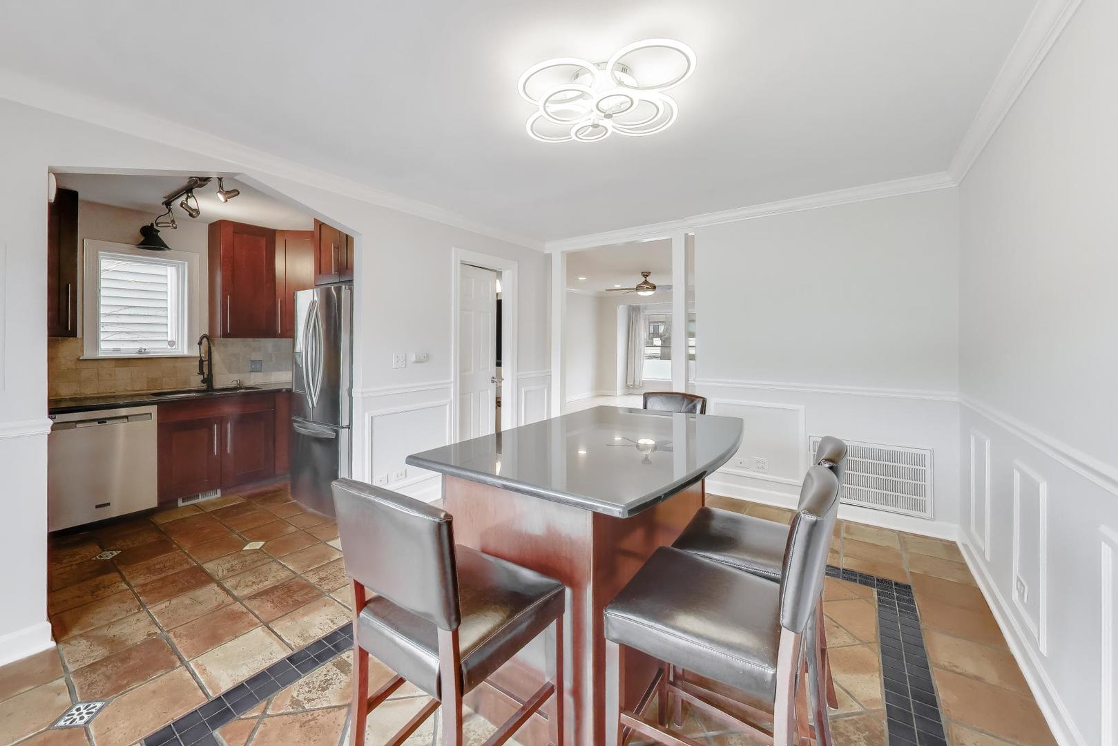 3413 South Indiana Avenue Chicago, IL 60616 - Photo 5 of 15 a dining room with furniture and window