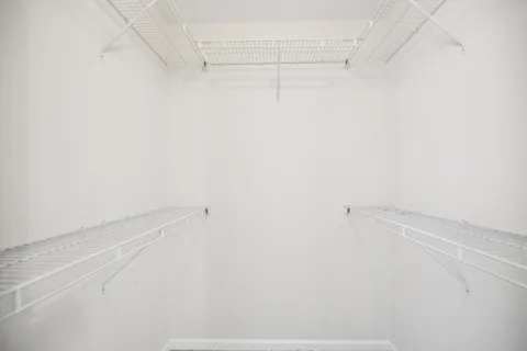 a view of small space with racks on the wall