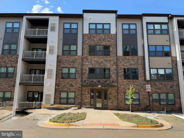 a view of building with white door
