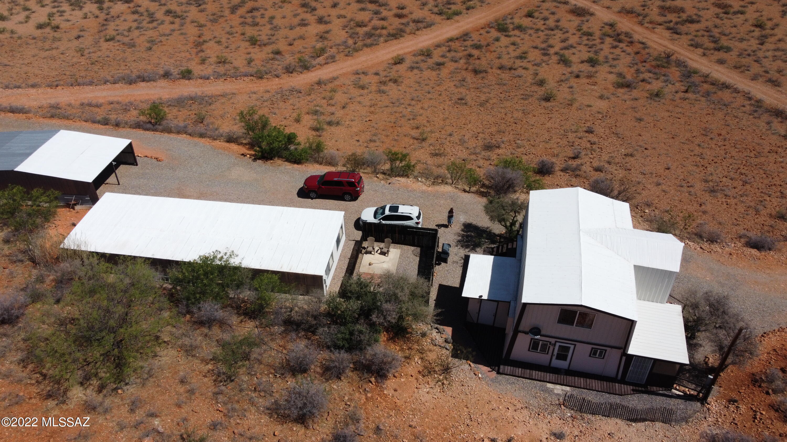 3399 Red Stag Road Pearce, AZ 85625 - Photo 3 of 47 an aerial view of a house with a yard