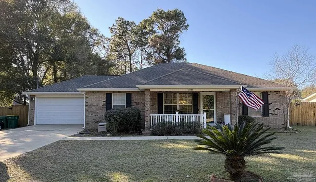 a view of a house with a garden