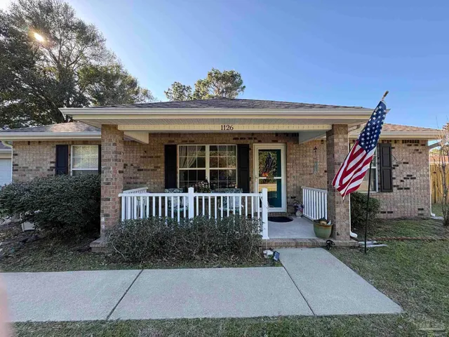 a view of a house with a porch