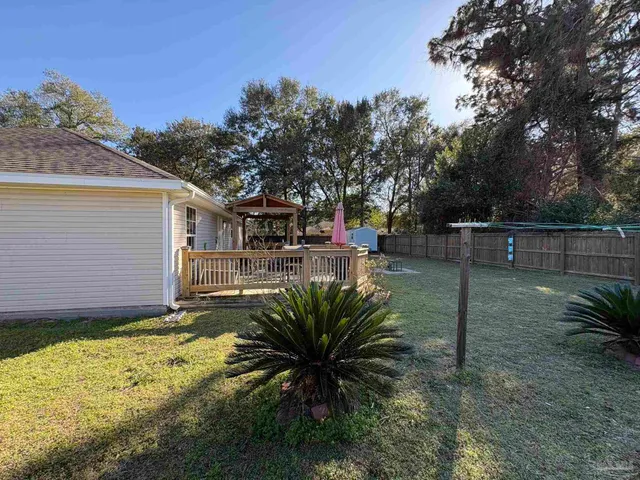 a view of a backyard with plants