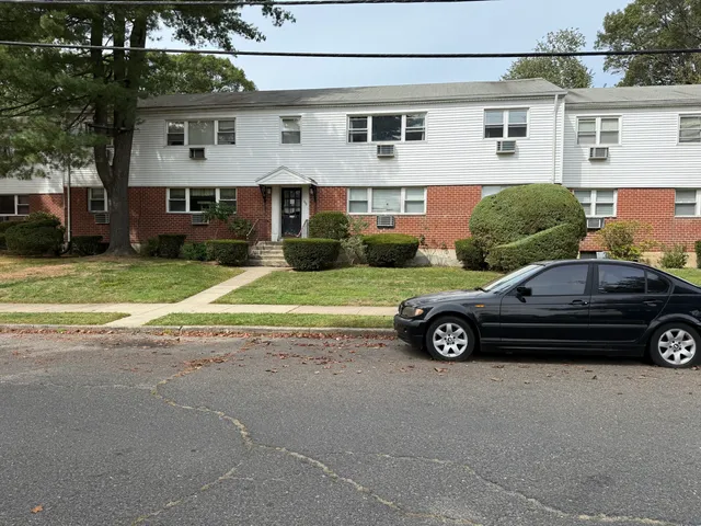 a car parked in front of a house