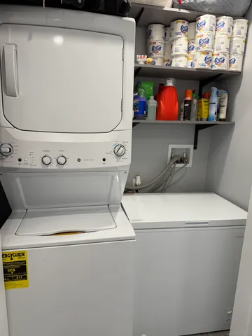 a utility room with washer and dryer