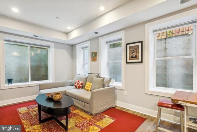 1340 Nicholson Street Northwest, Unit 2 Washington, DC 20011 - Photo 11 of 31 a living room with furniture and a window