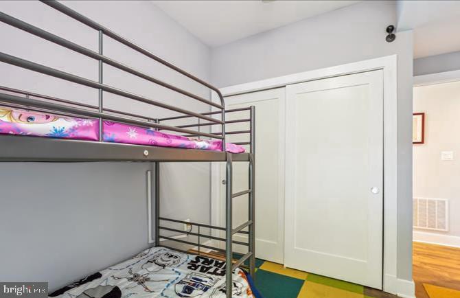1340 Nicholson Street Northwest, Unit 2 Washington, DC 20011 - Photo 22 of 31 a bedroom with a bed and a window