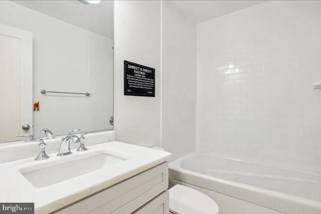 1340 Nicholson Street Northwest, Unit 2 Washington, DC 20011 - Photo 24 of 31 a bathroom with a sink toilet and bathtub