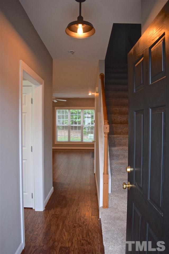 9106 Grassington Way Raleigh, NC 27615 - Photo 2 of 16 a view of a livingroom with furniture and chandelier