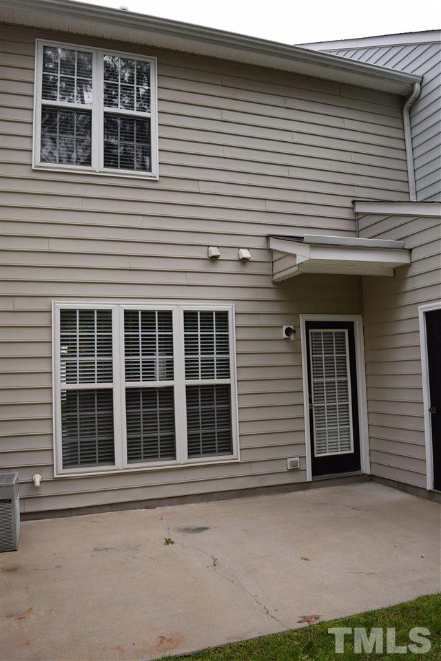 9106 Grassington Way Raleigh, NC 27615 - Photo 13 of 16 a front view of a house