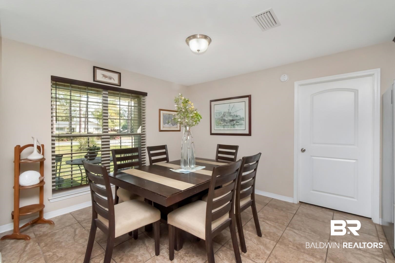 11528 Mocking Bird Lane Fairhope, AL 36532 - Photo 12 of 45 Dining room with baseboards