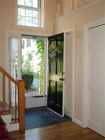 17 Argilla Road, Unit 5 Ipswich, MA 01938 - Photo 3 of 16 an empty room with wooden floor and windows