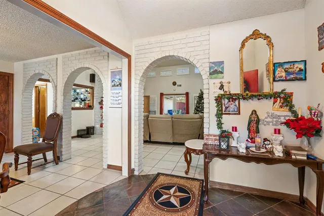 a view of a livingroom with furniture and toys
