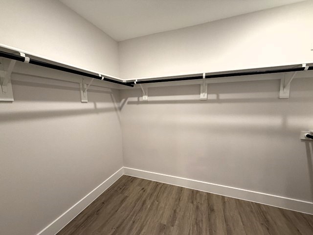 5611 Mobeetie Loop Bee Cave, TX 78738 - Photo 16 of 22 a view of a room with racks on the wall
