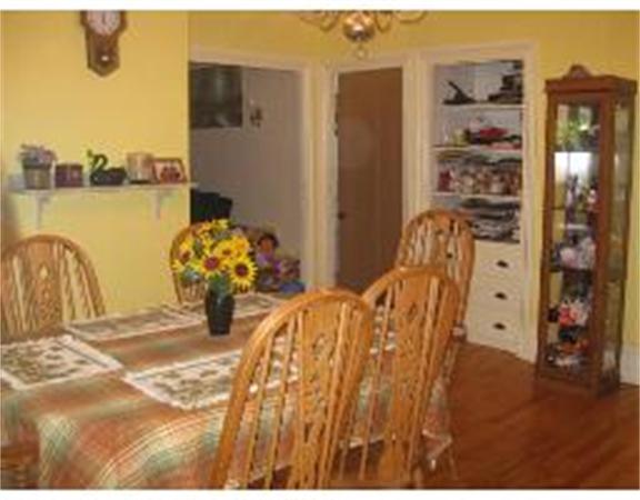 19 Main Street Little Compton, RI 02837 - Photo 11 of 25 a view of a bedroom with bed and toys