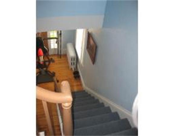 19 Main Street Little Compton, RI 02837 - Photo 14 of 25 a view of entryway and hall with wooden floor