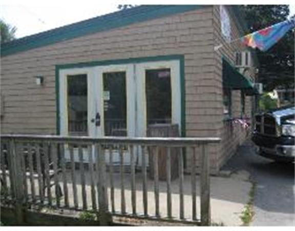 19 Main Street Little Compton, RI 02837 - Photo 24 of 25 a view of a house with a small yard