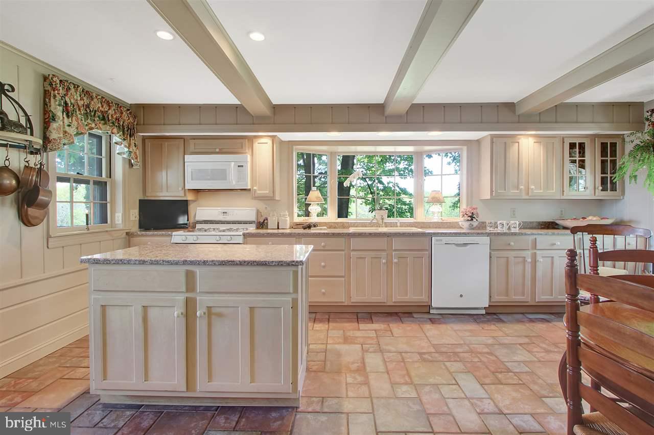 305 Crooked Creek Road Gettysburg, PA 17325 - Photo 13 of 36 a kitchen with a sink cabinets and window
