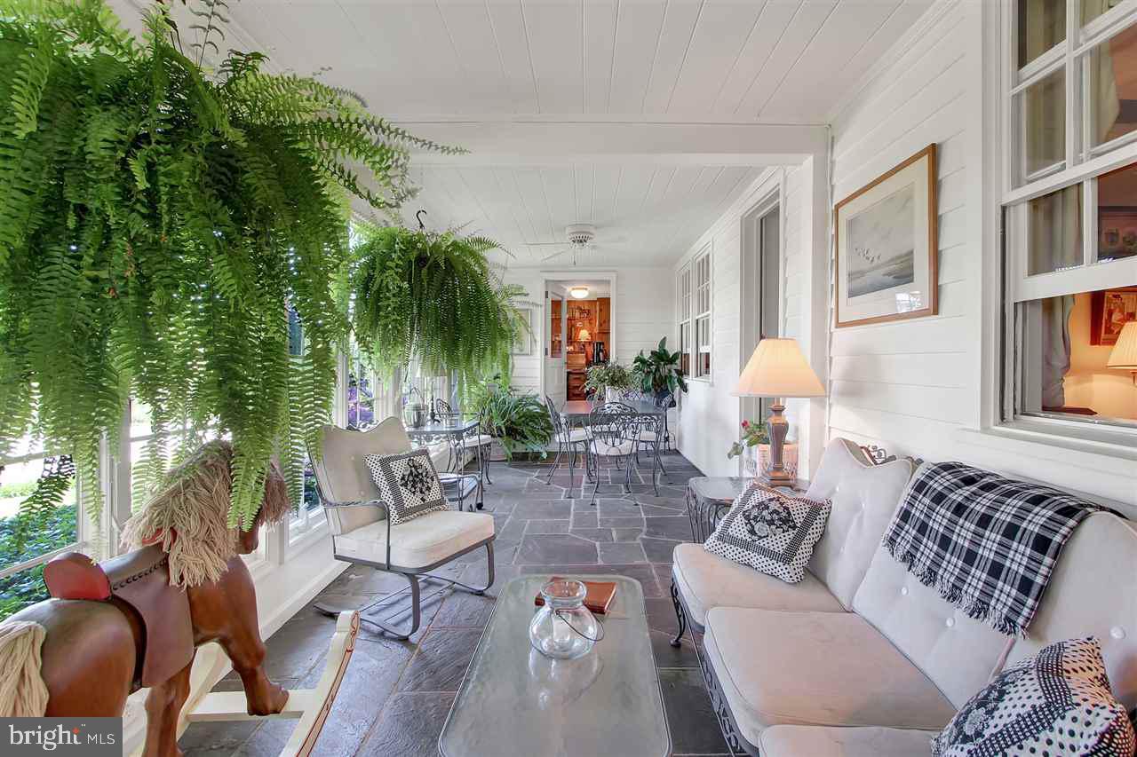 305 Crooked Creek Road Gettysburg, PA 17325 - Photo 18 of 36 a living room with furniture and a potted plant