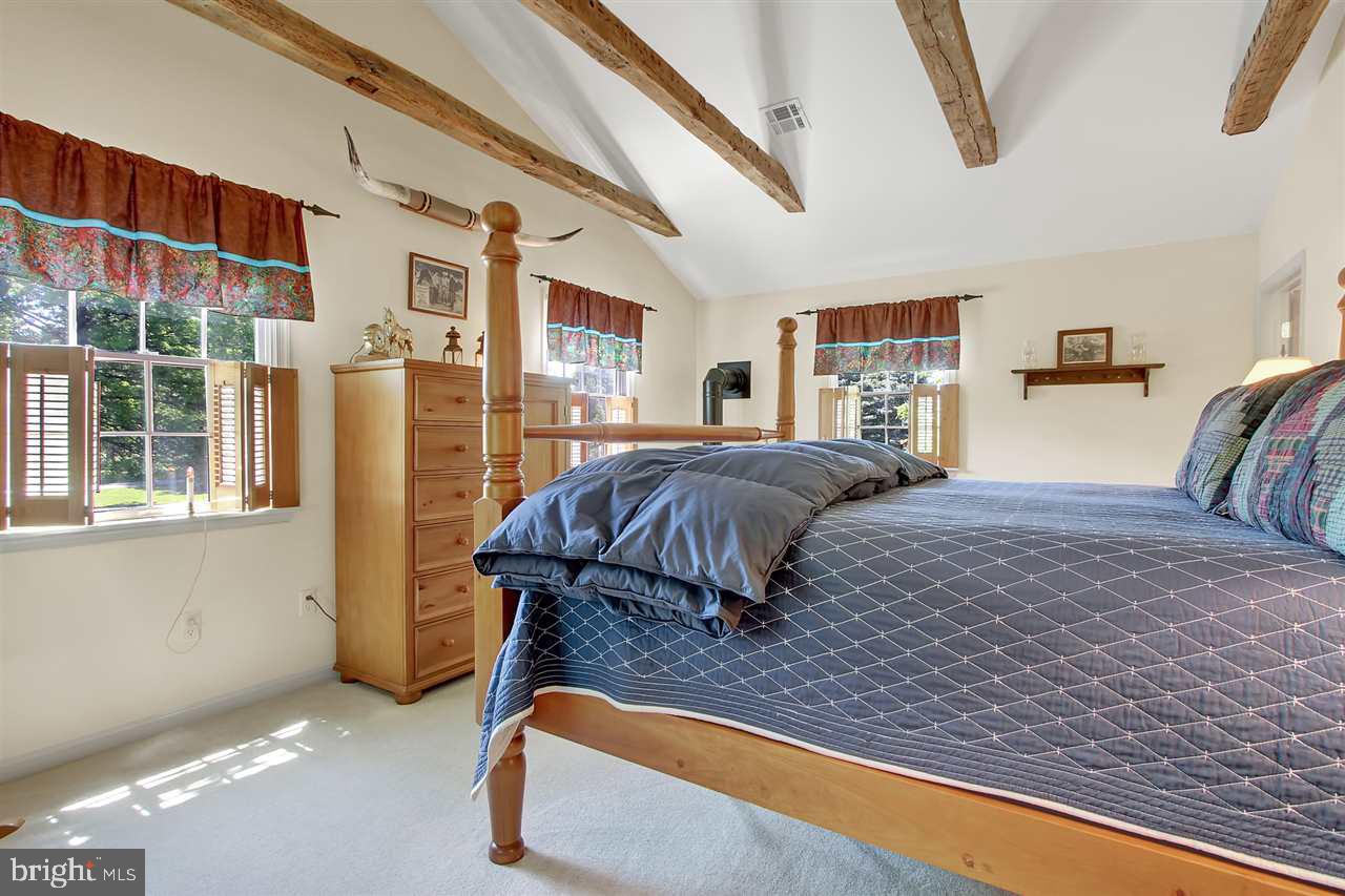 305 Crooked Creek Road Gettysburg, PA 17325 - Photo 20 of 36 a bedroom with a bed and window