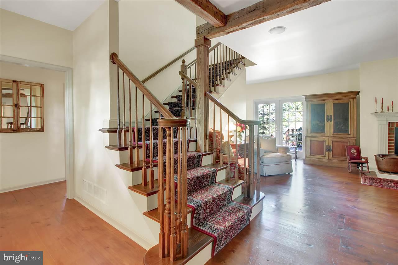 305 Crooked Creek Road Gettysburg, PA 17325 - Photo 3 of 36 a view of entryway livingroom and hall with wooden floor