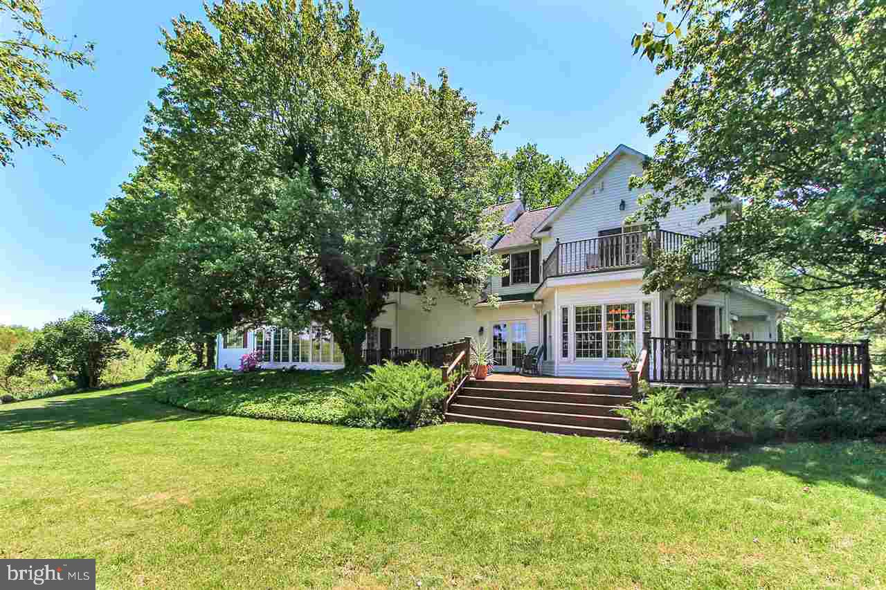 305 Crooked Creek Road Gettysburg, PA 17325 - Photo 23 of 36 a front view of a house with a yard