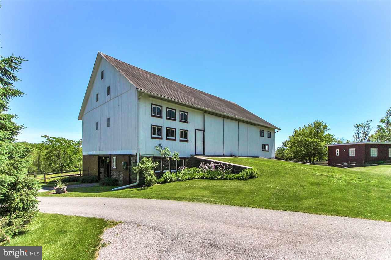 305 Crooked Creek Road Gettysburg, PA 17325 - Photo 28 of 36 a front view of a house with garden