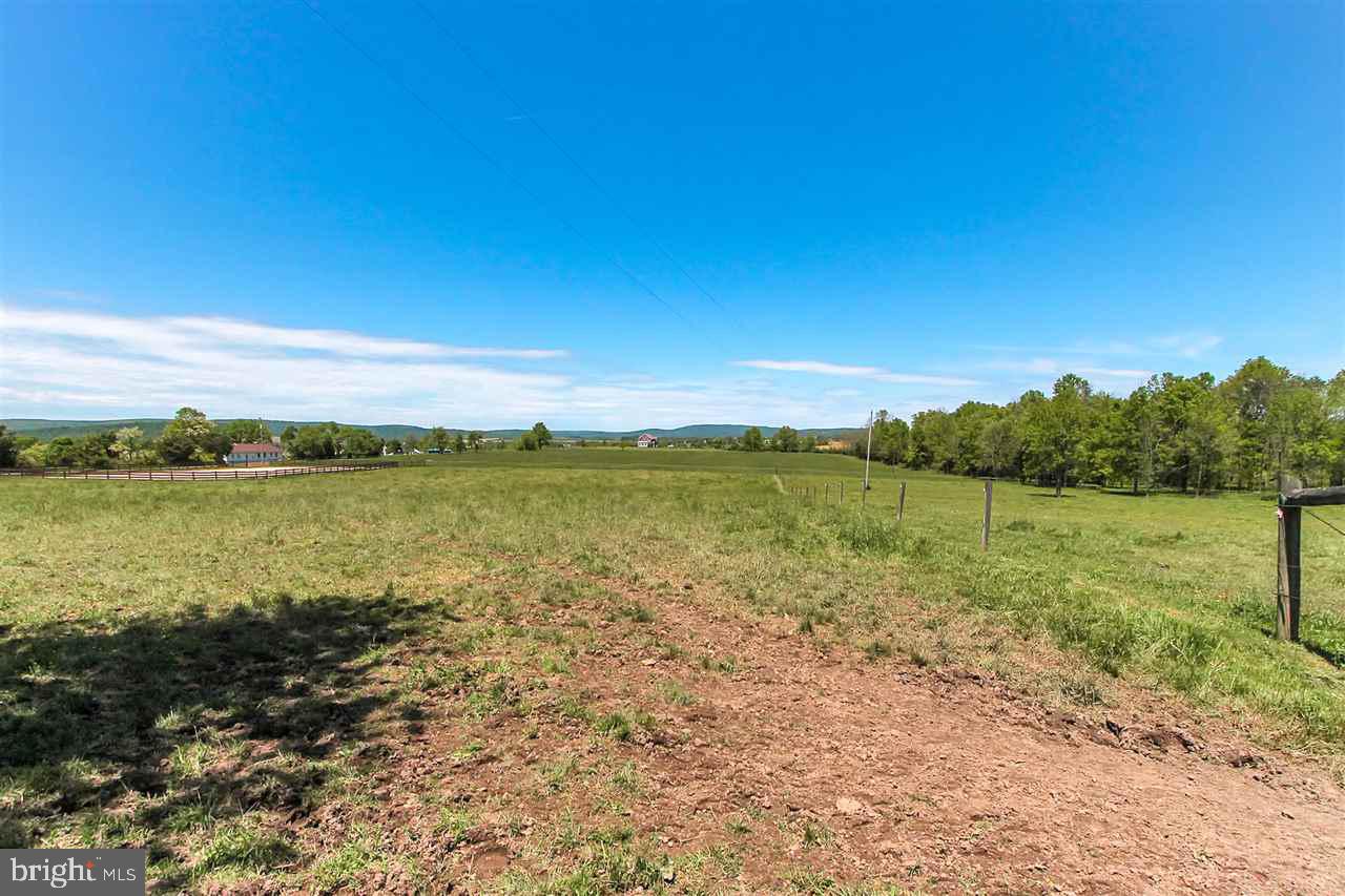 305 Crooked Creek Road Gettysburg, PA 17325 - Photo 31 of 36 a view of a lake with houses in the background
