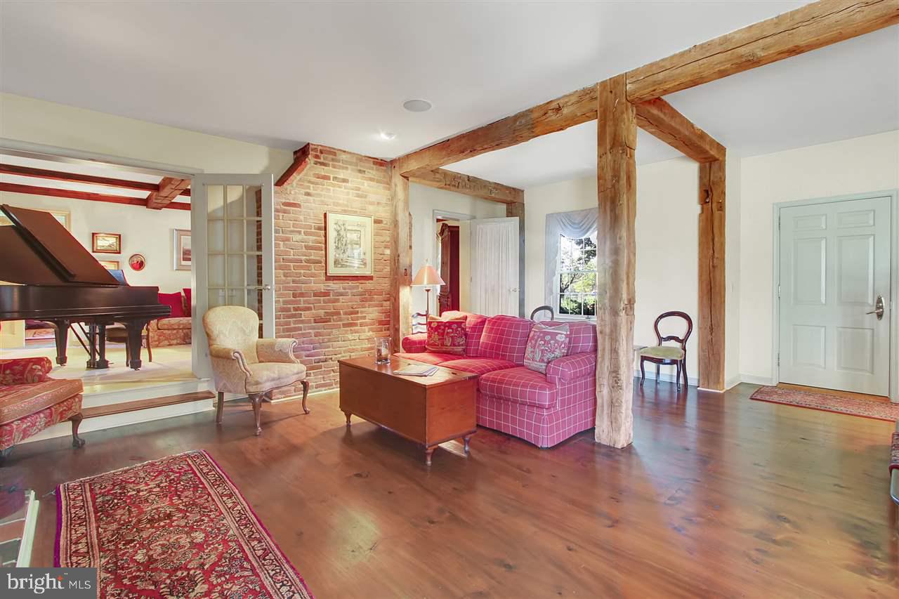305 Crooked Creek Road Gettysburg, PA 17325 - Photo 5 of 36 a living room with furniture and wooden floor