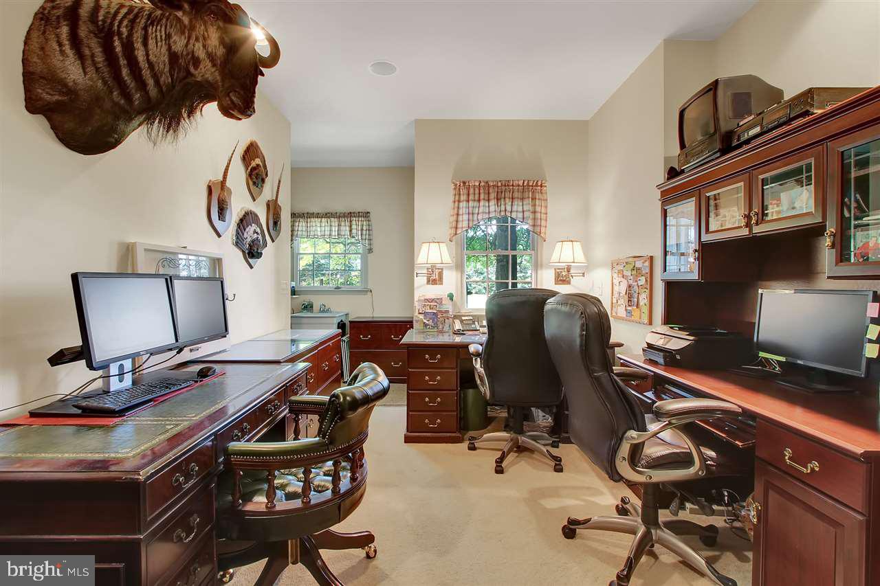 305 Crooked Creek Road Gettysburg, PA 17325 - Photo 9 of 36 a view of a workspace with furniture and a window