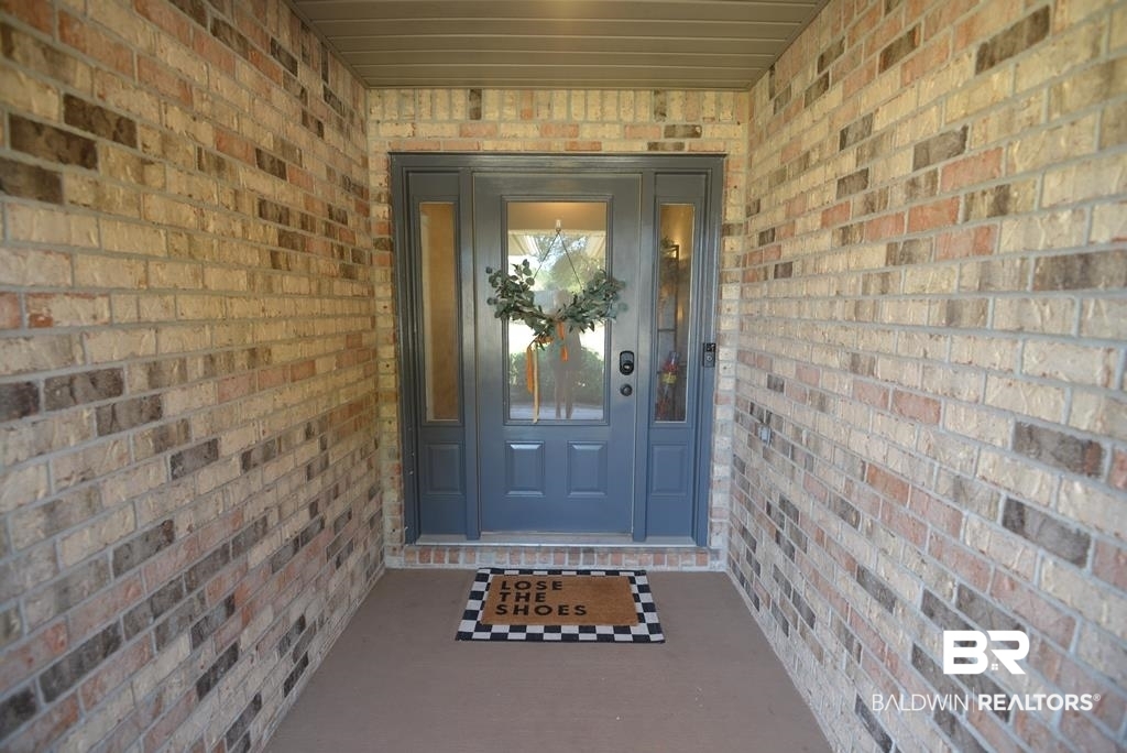11201 Herschel Loop Daphne, AL 36526 - Photo 28 of 32 Entrance to property featuring a porch