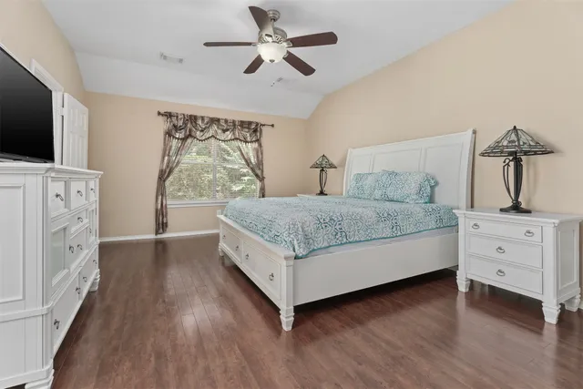 a living room with furniture fireplace and flat screen tv