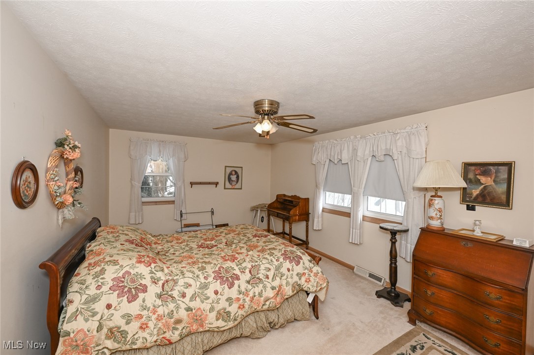 30875 Cannon Road Solon, OH 44139 - Photo 36 of 48 Carpeted bedroom with a ceiling fan