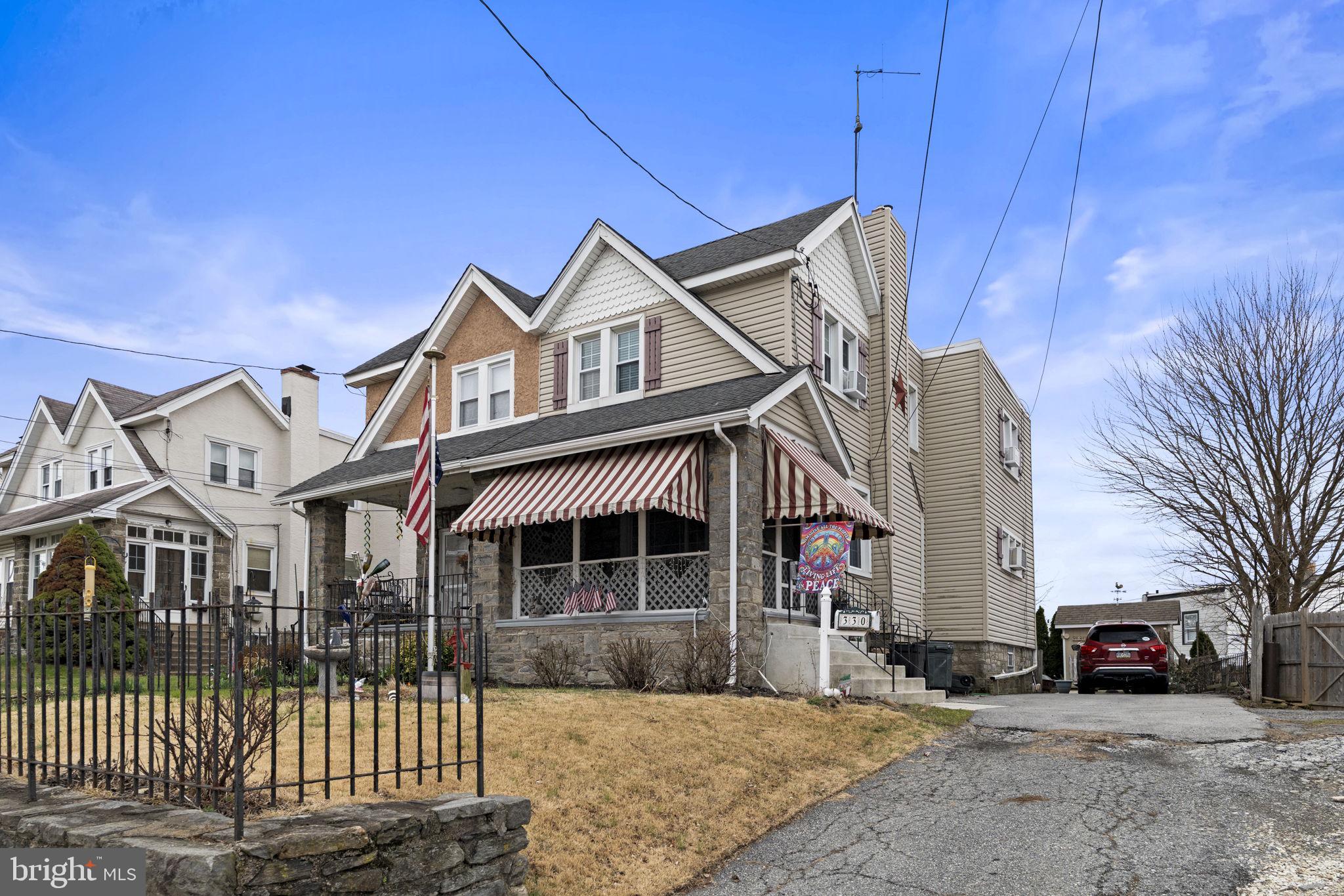 330 Burmont Road Drexel Hill, PA 19026 - Photo 1 of 35 a front view of a house with a yard