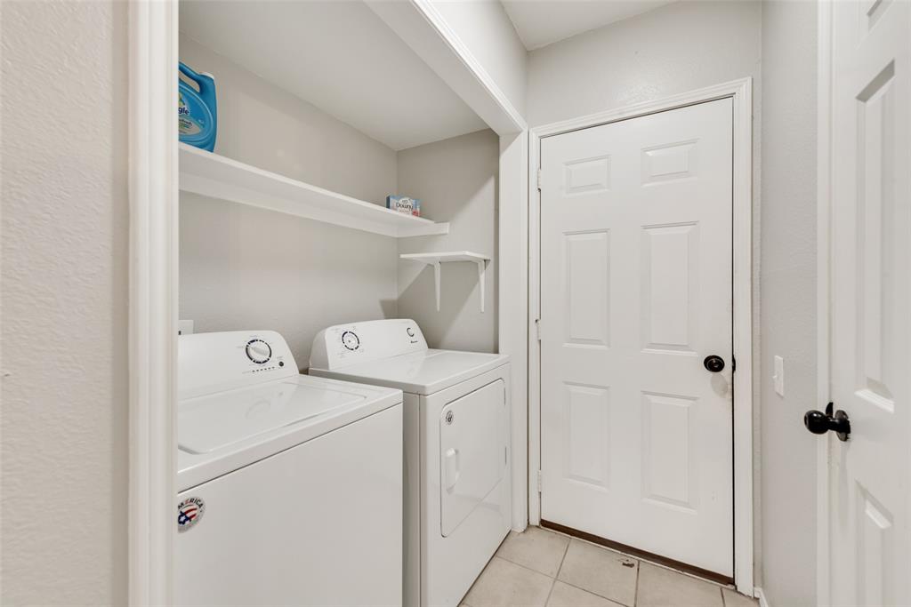 2629 Coldstream Drive Fort Worth, TX 76123 - Photo 14 of 24 a utility room with dryer and washer